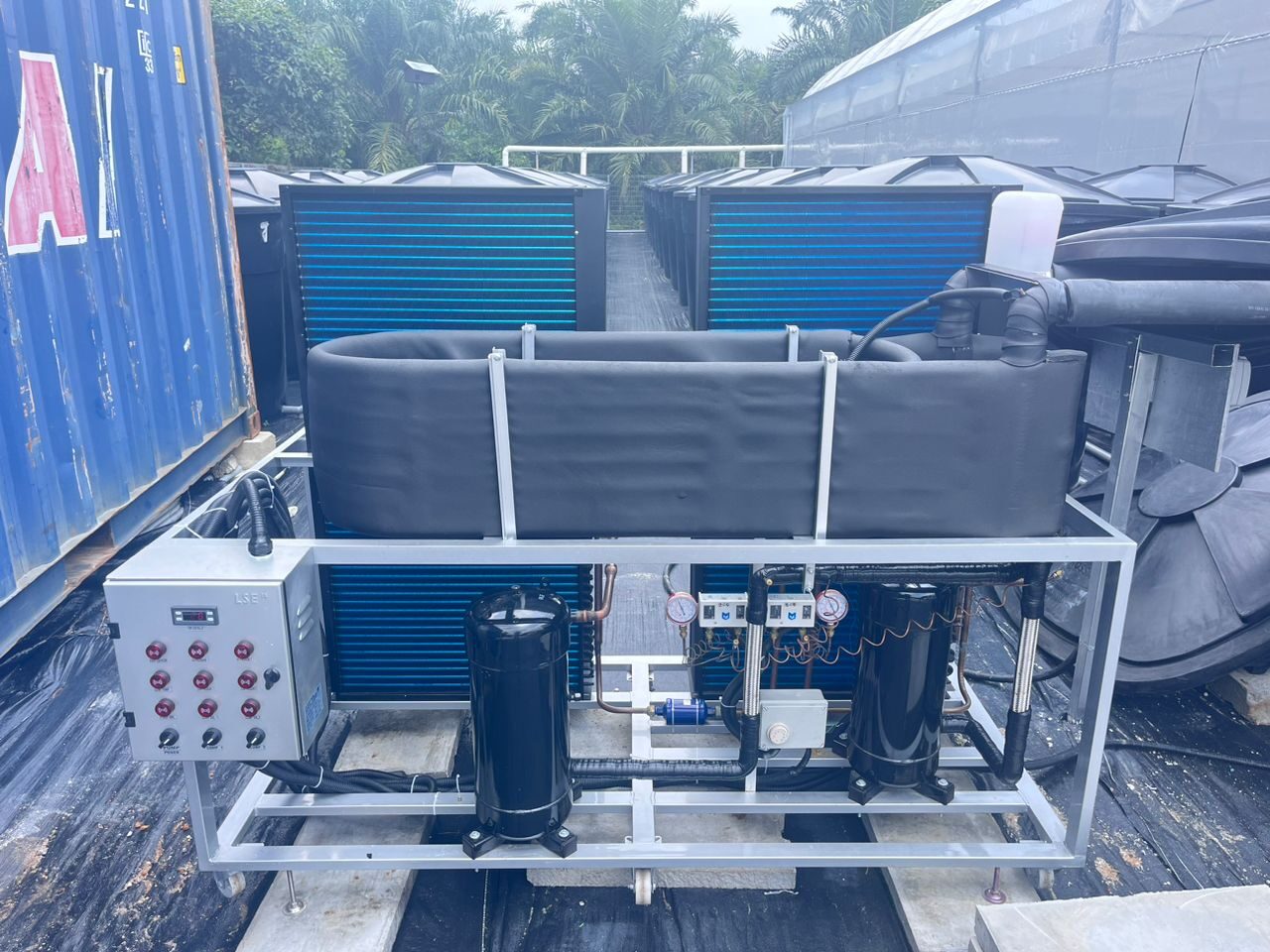 Industrial water-chiller and climate-control plant adjacent to the greenhouse